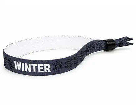 Mørkt festivalarmbånd med snøfnugg